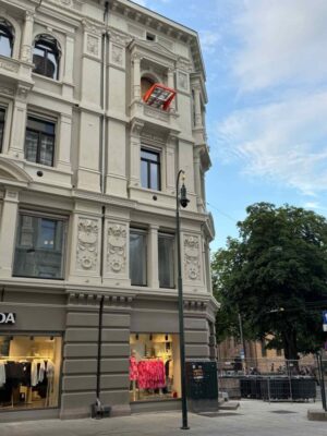 Liftroller Wall on the facade of Koppgården building.