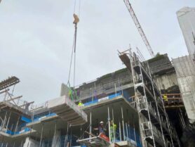 Belevue_New build_Byggmester Markhus_Liftroller Floor Crane lowering construction materials onto a Liftroller Floor at a new build project..